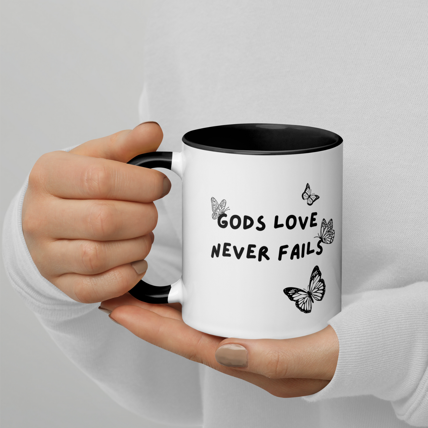 GODS LOVE NEVER FAILS MUG